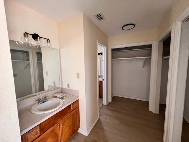 1200 Kline Avenue, Unit B Odem, TX 78370 - Photo 8 of 10 a bathroom with a sink and a mirror