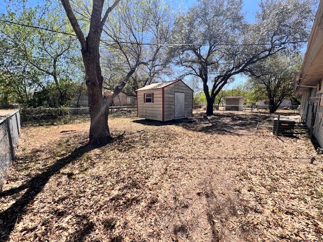 1200 Kline Avenue, Unit B Odem, TX 78370 - Photo 10 of 10 a front view of a house with a yard covered in snow