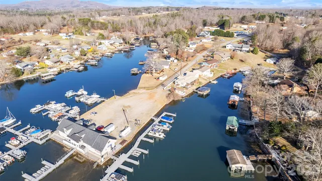 a dining room with furniture a rug and wooden floor