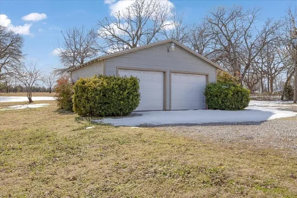 a view of a front of house with a yard