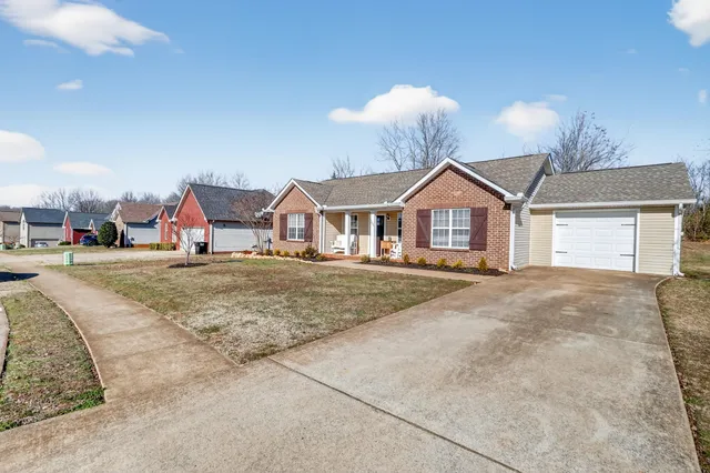 a view of house with outdoor space