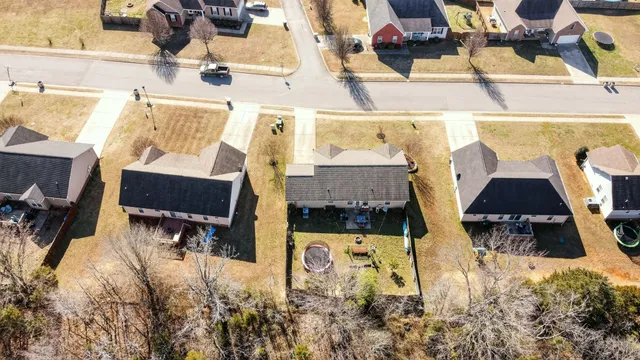 a view of swimming pool with sitting area and furniture