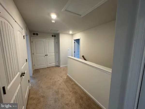 a bathroom with a granite countertop toilet sink and shower