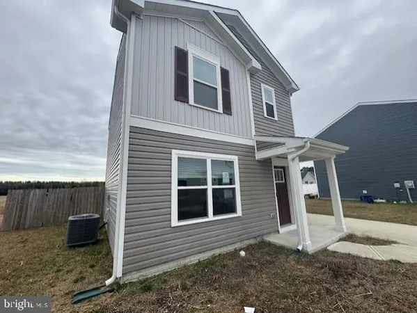a view of backyard of house