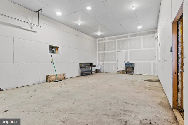 an aerial view of a house with garden