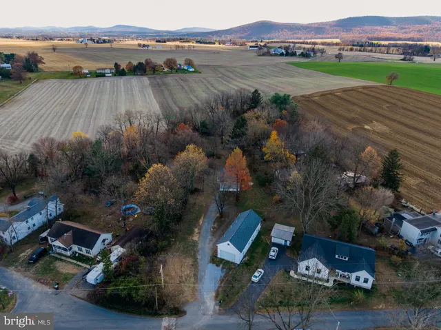 an aerial view of residential house with outdoor space