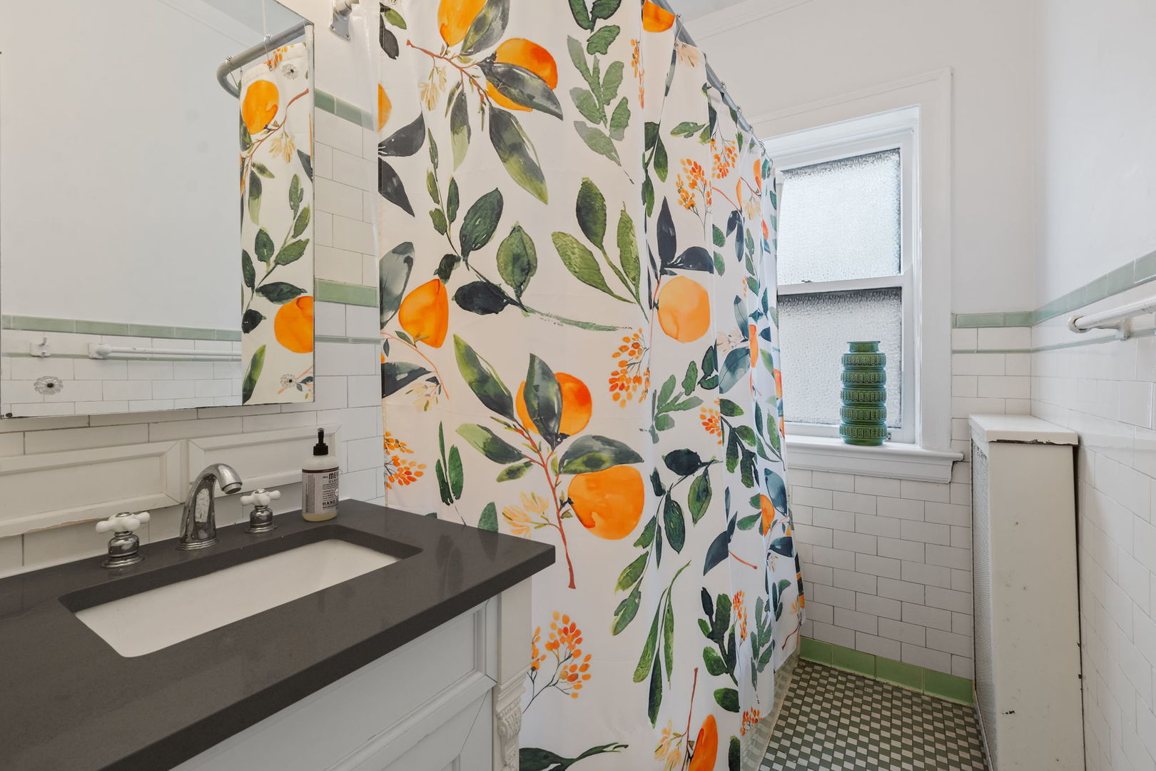 548 Sheridan Road, Unit 2N Evanston, IL 60202 - Photo 17 of 18 a bathroom with a sink and a mirror