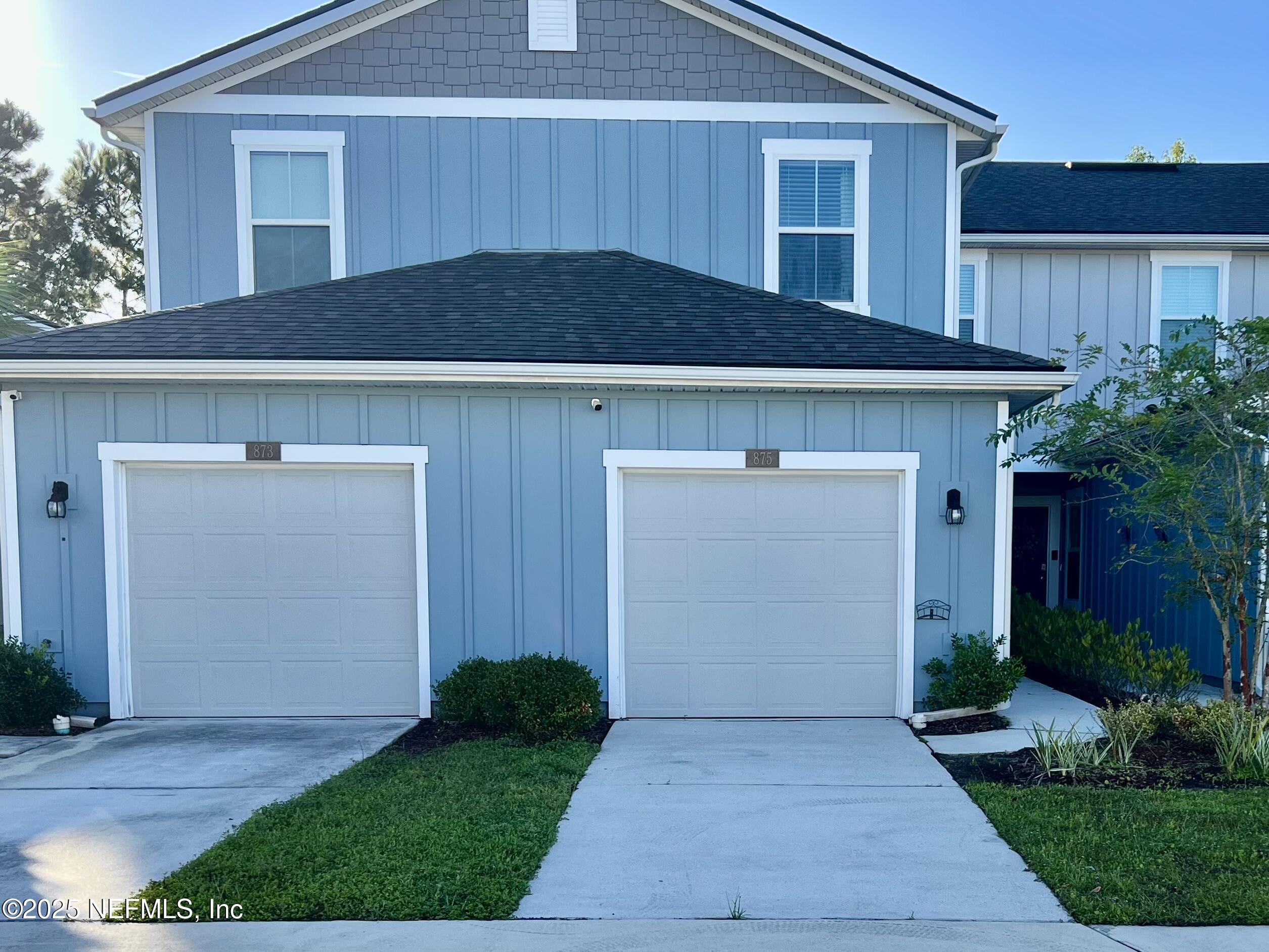 875 Capitol Parkway Jacksonville, FL 32218 - Photo 1 of 20 a view of a house with a yard