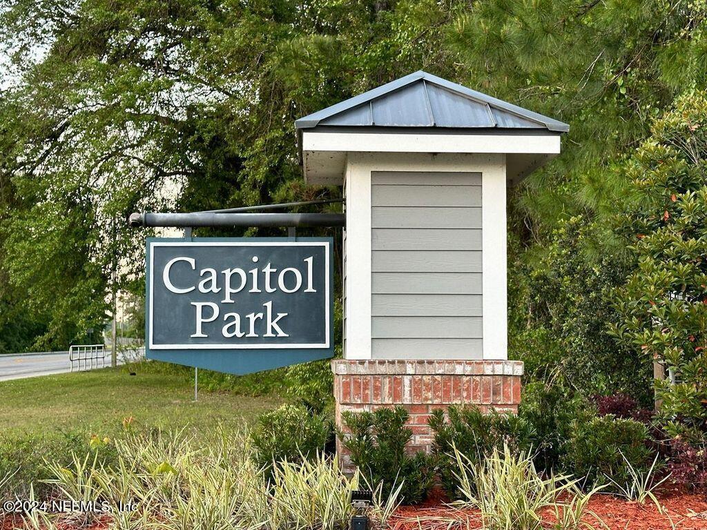 875 Capitol Parkway Jacksonville, FL 32218 - Photo 17 of 20 a view of a sign of a park next to a road