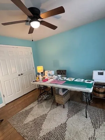a room that has a table and chair in it