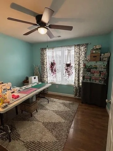 a bed room with a bed and a window