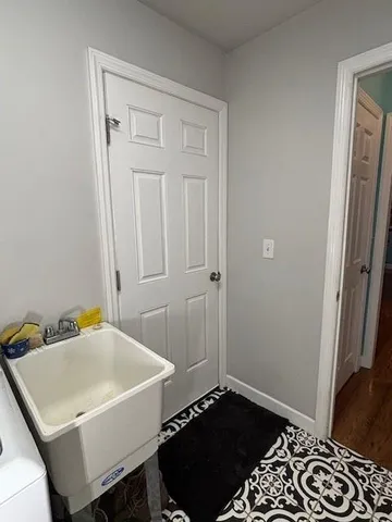 a bedroom with a bed and a table