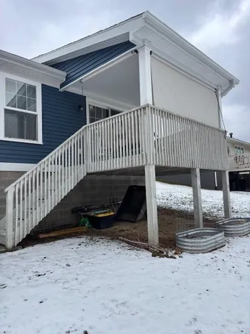 a view of a porch with a bench