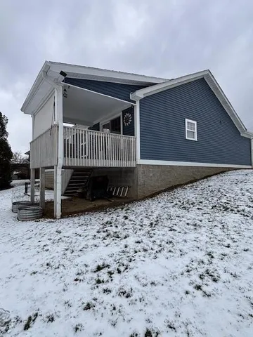 a view of a backyard with a fence