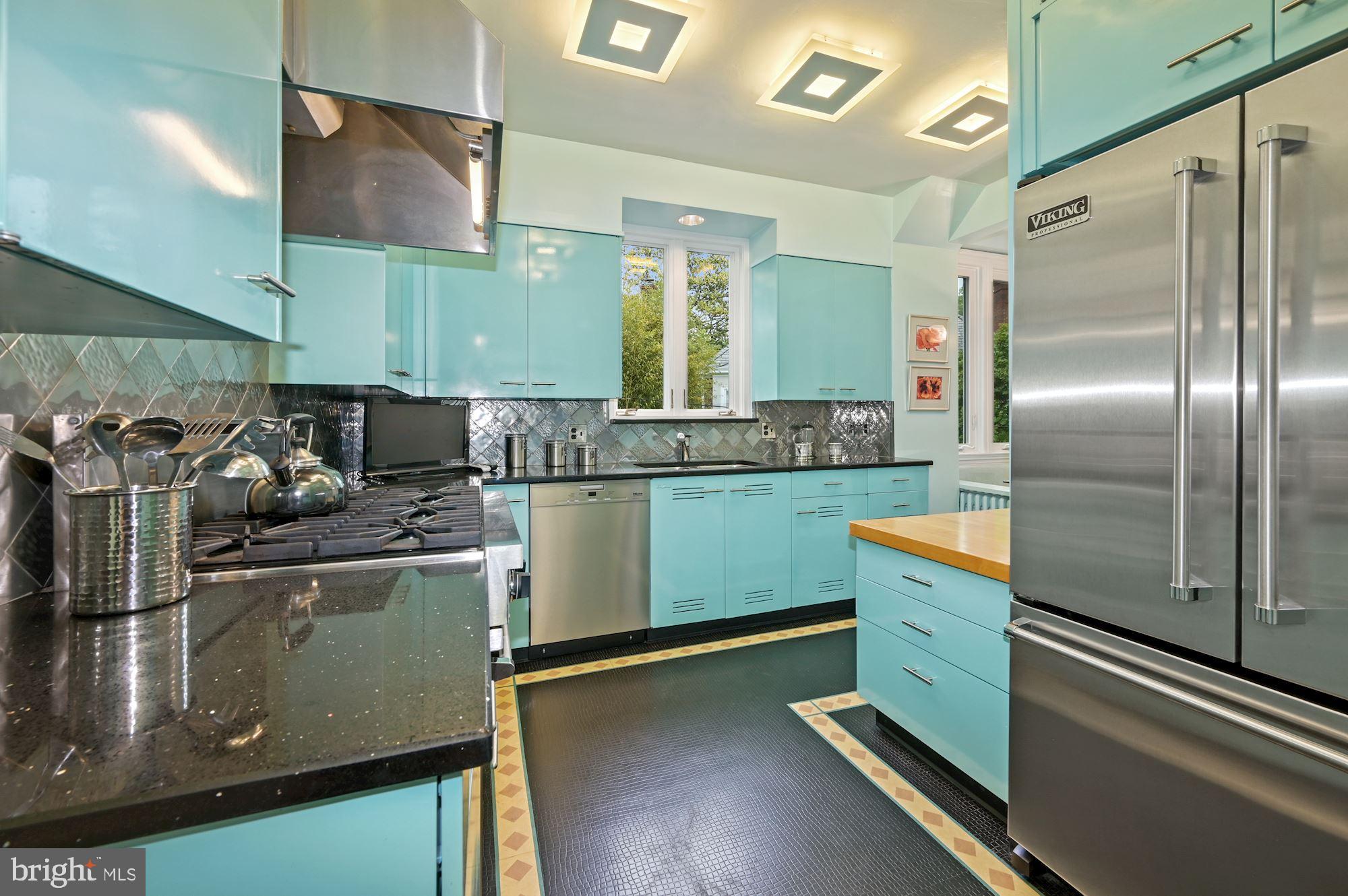 3215 Klingle Road Northwest Washington, DC 20008 - Photo 9 of 35 Kitchen with Stainless Steel Appliances