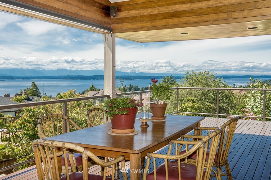 3904 Southwest Frontenac Street Seattle, WA 98136 - Photo 14 of 38 a view of a balcony with lake view and mountain view