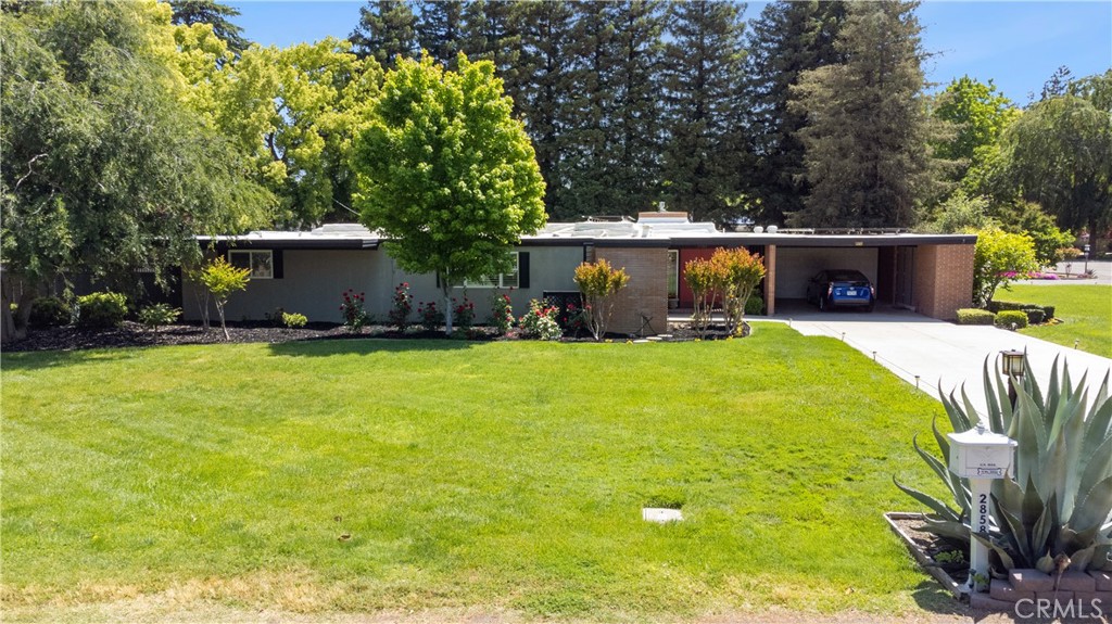 2858 Forist Lane Merced, CA 95340 - Photo 3 of 57 a front view of house with yard and trees
