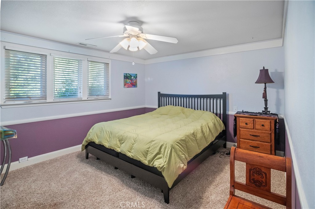 2858 Forist Lane Merced, CA 95340 - Photo 37 of 57 a bed sitting in a bedroom next to a window