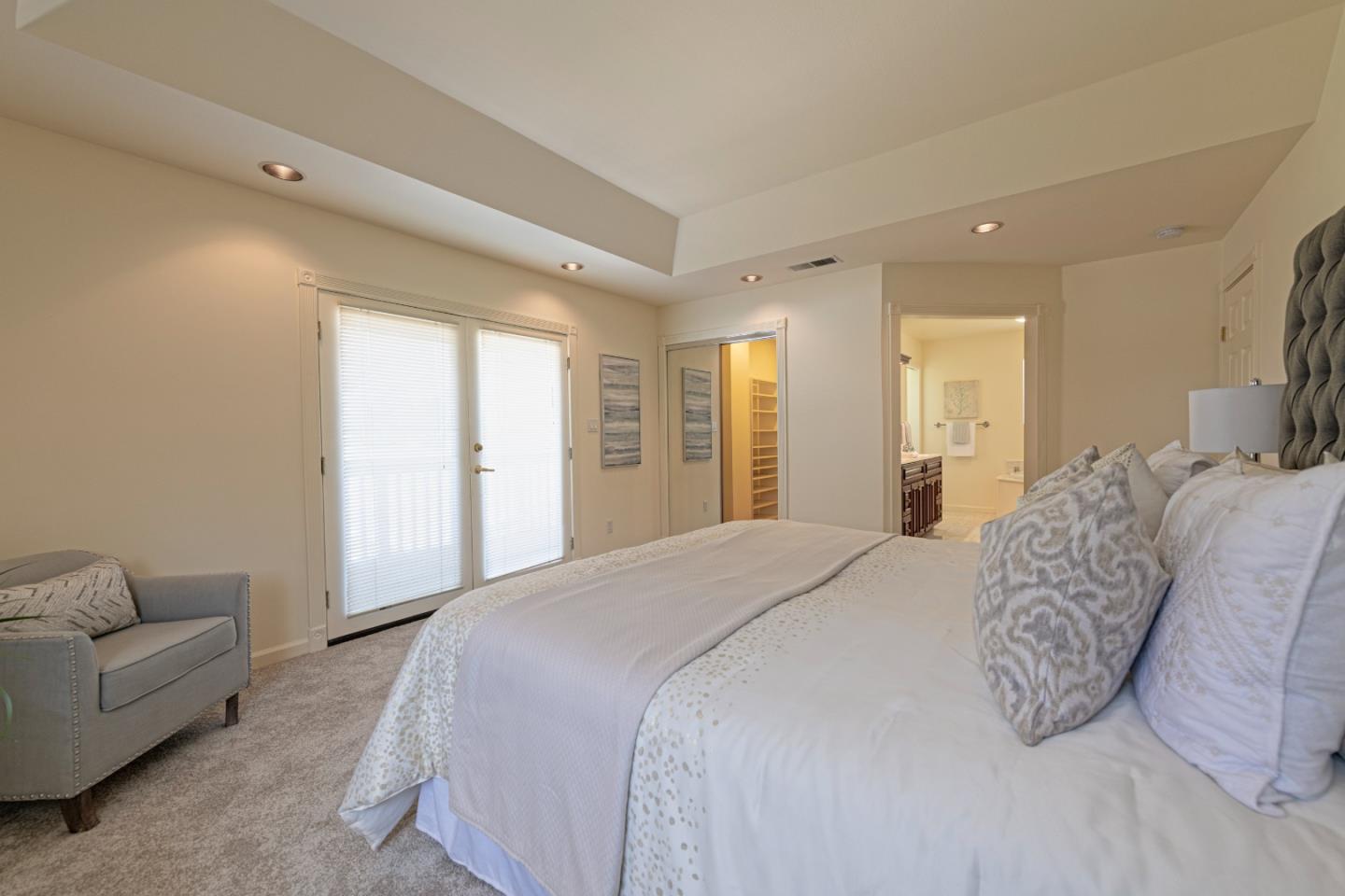 1623 Corte Via Los Altos, CA 94024 - Photo 11 of 25 a spacious bedroom with a bed a couch and a window
