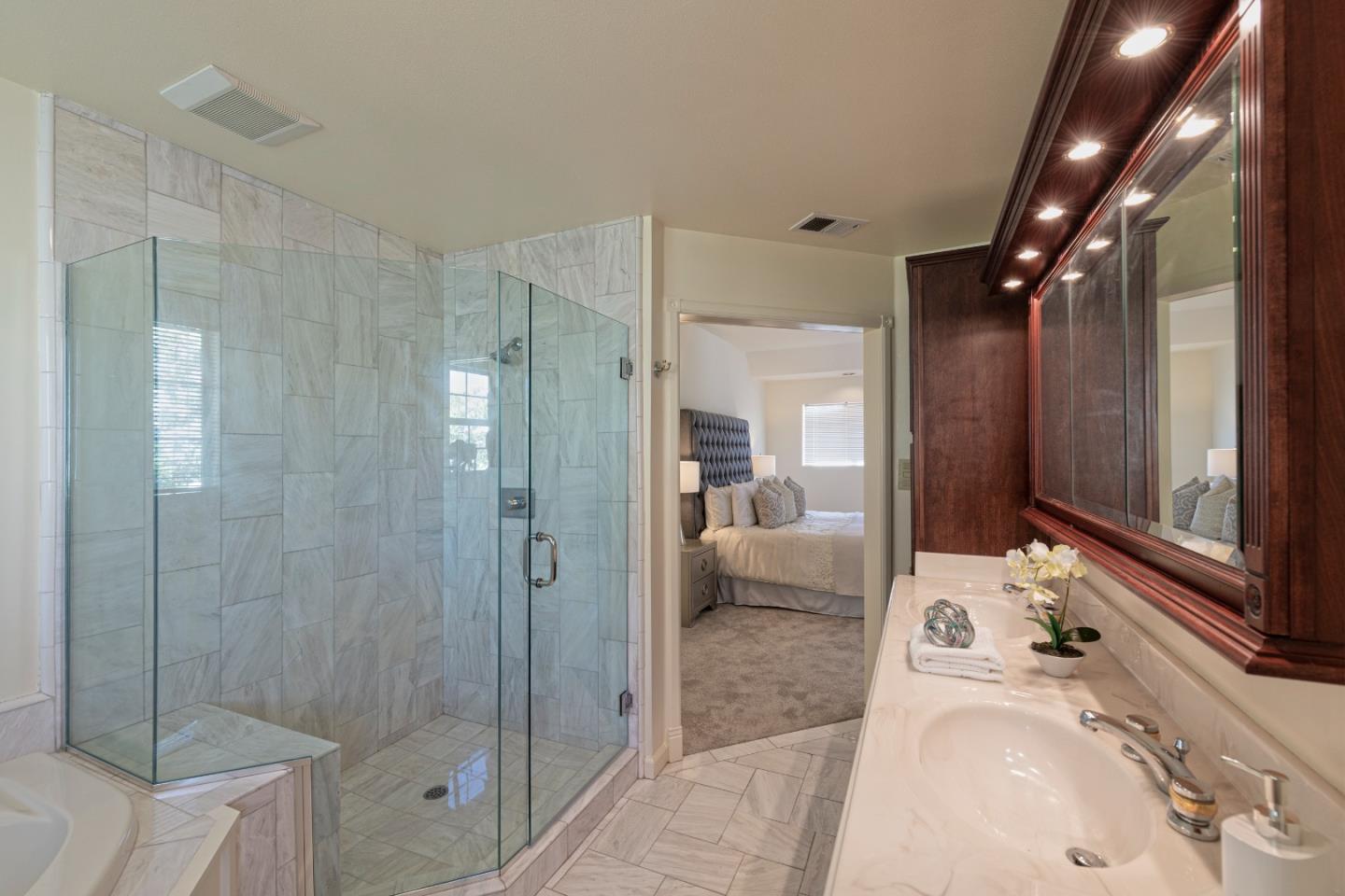 1623 Corte Via Los Altos, CA 94024 - Photo 14 of 25 a bathroom with a tub sink shower and mirror