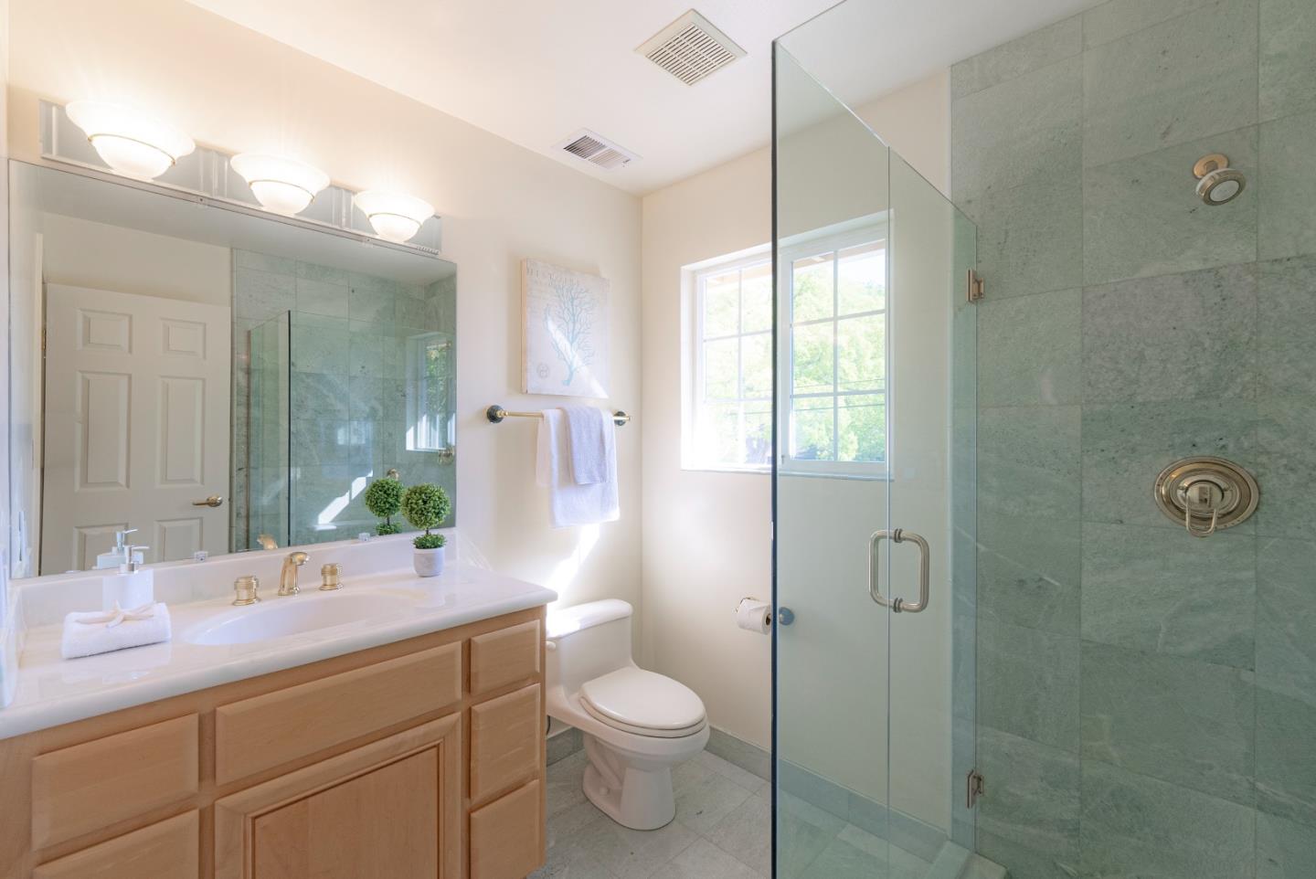 1623 Corte Via Los Altos, CA 94024 - Photo 18 of 25 a bathroom with a sink a toilet a large mirror and shower