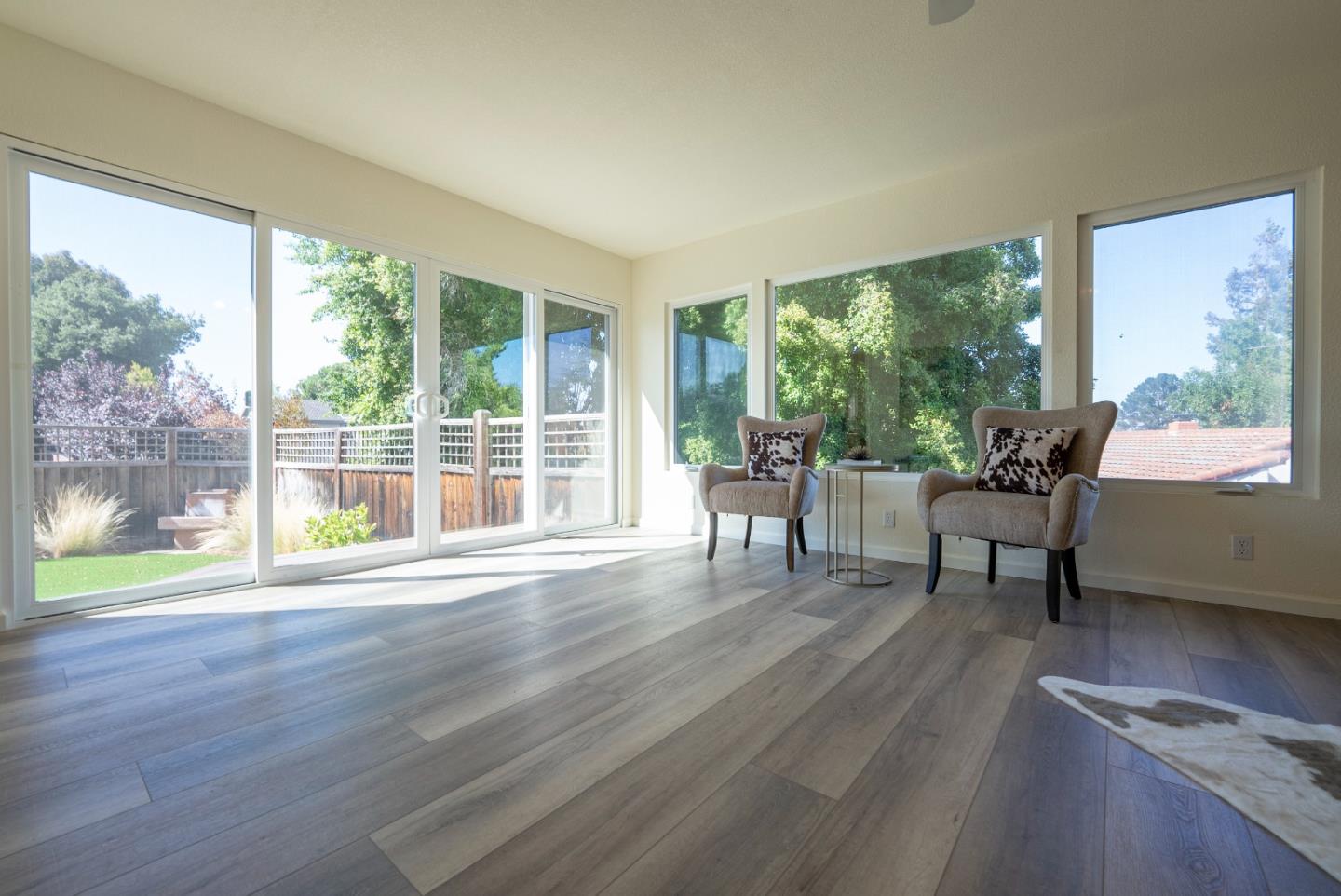 1623 Corte Via Los Altos, CA 94024 - Photo 23 of 25 a living room with furniture and a large window