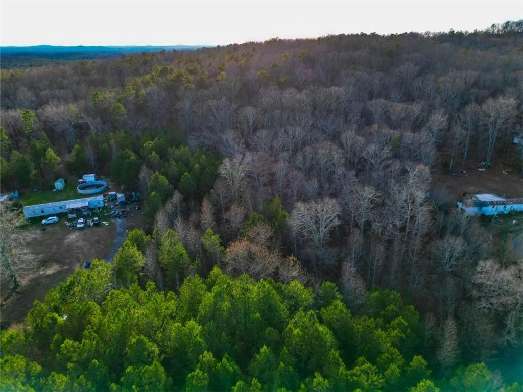 750 Flowery Branch Road Kingston, GA 30145 - Photo 5 of 6 a view of a house with a yard