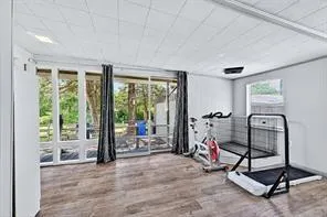 a view of a room with gym equipment