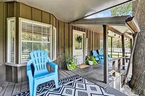 a view of balcony with patio