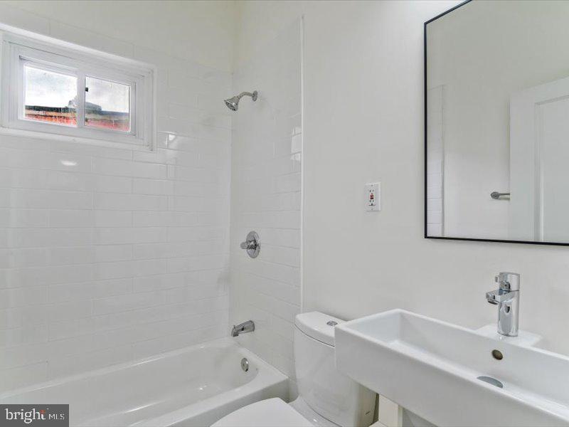 1200 D Street Northeast Washington, DC 20002 - Photo 33 of 47 Sleek, modern bathroom oasis.