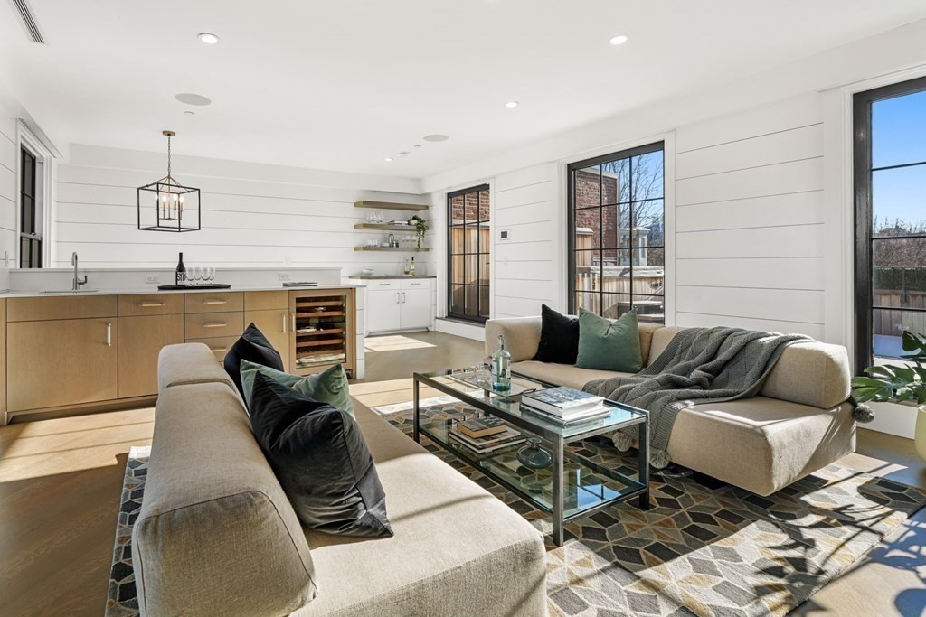 75 Beacon Street, Unit 2 Boston, MA 02108 - Photo 20 of 37 a living room with furniture wooden floor and kitchen view
