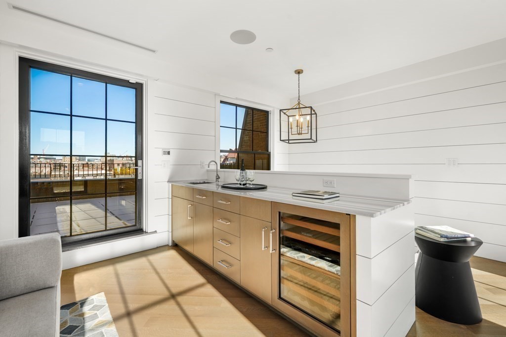 75 Beacon Street, Unit 2 Boston, MA 02108 - Photo 22 of 37 a kitchen with a stove and a sink