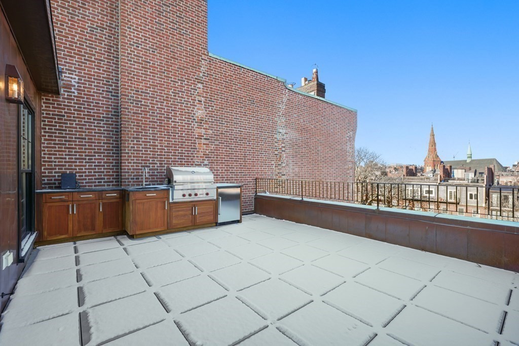 75 Beacon Street, Unit 2 Boston, MA 02108 - Photo 23 of 37 a view of a terrace with chairs