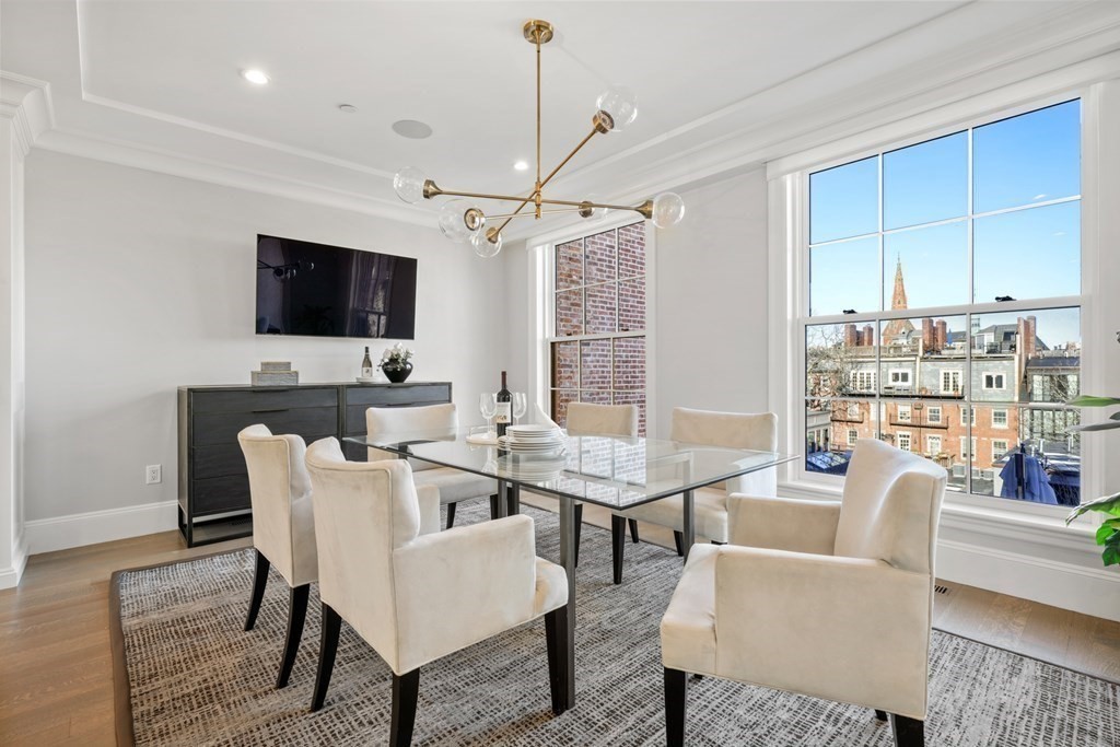 75 Beacon Street, Unit 2 Boston, MA 02108 - Photo 9 of 37 a view of a dining room with furniture
