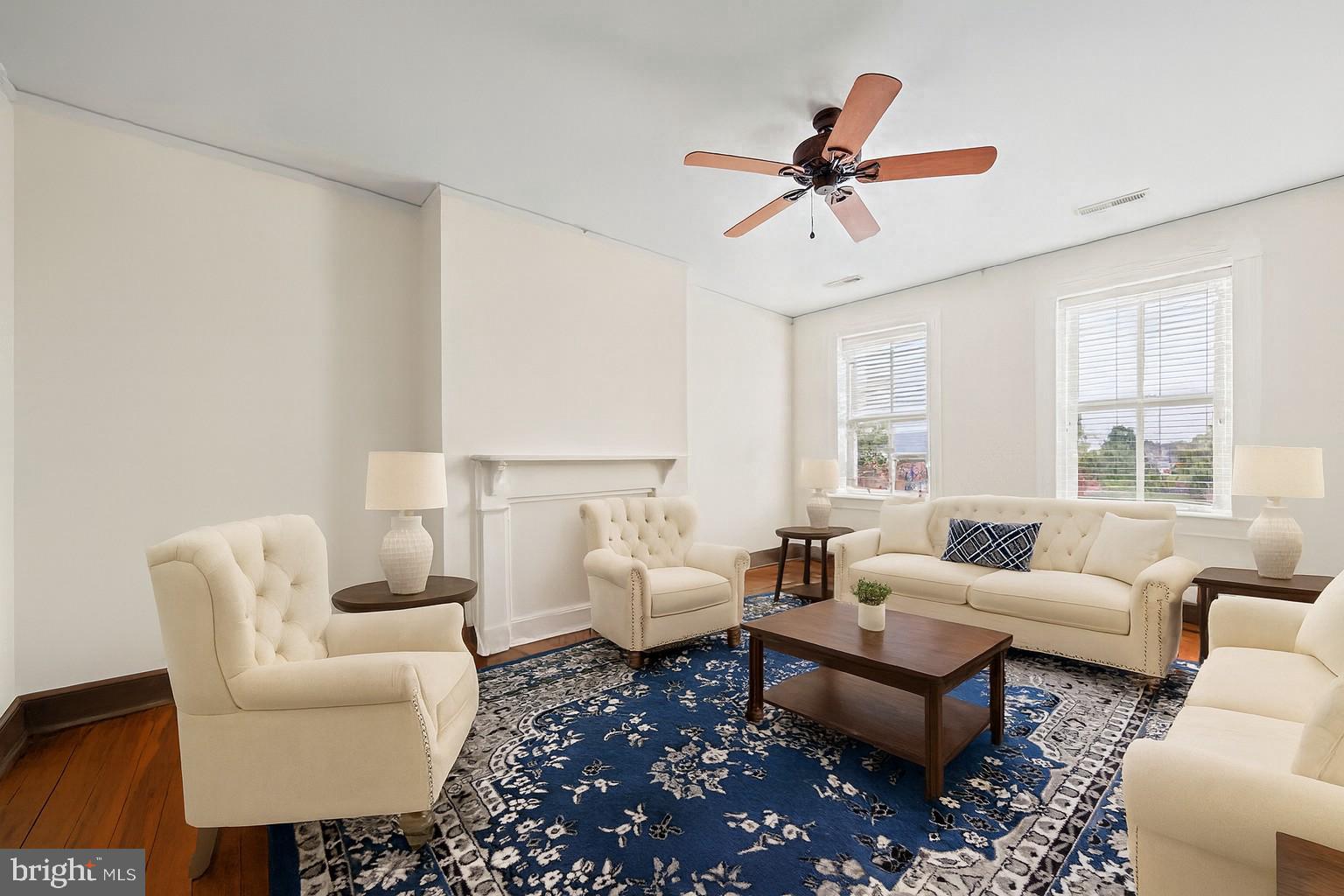 415 William Street, Unit A Fredericksburg, VA 22401 - Photo 5 of 17 a living room with furniture a ceiling fan and a window