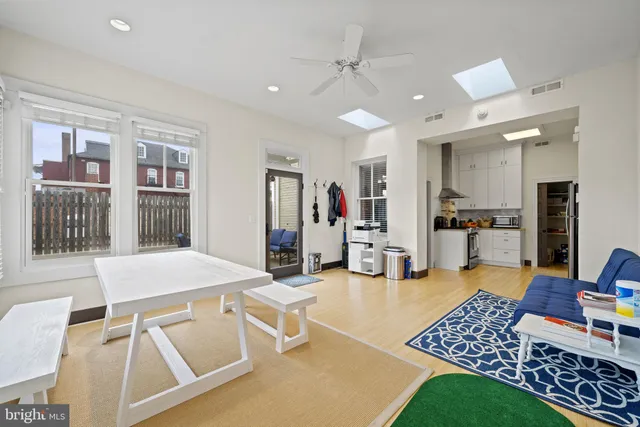 a outdoor space with lots of table and chairs