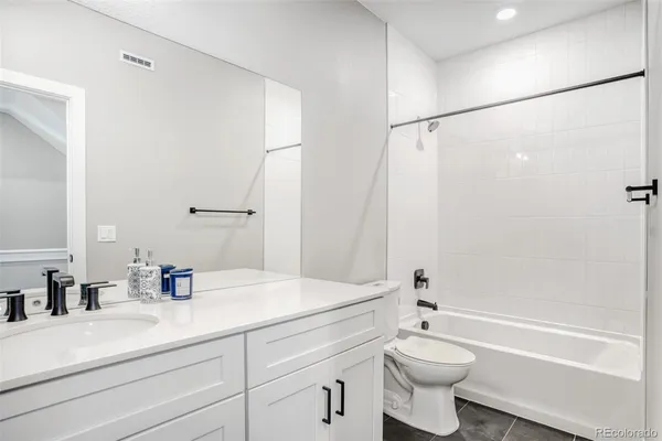a living room with furniture and window