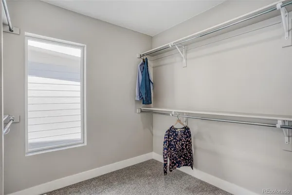 a view of balcony with furniture
