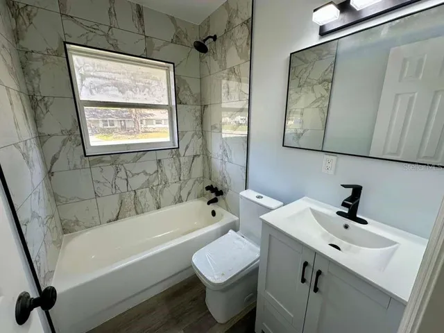 a bathroom with a sink and a bathtub