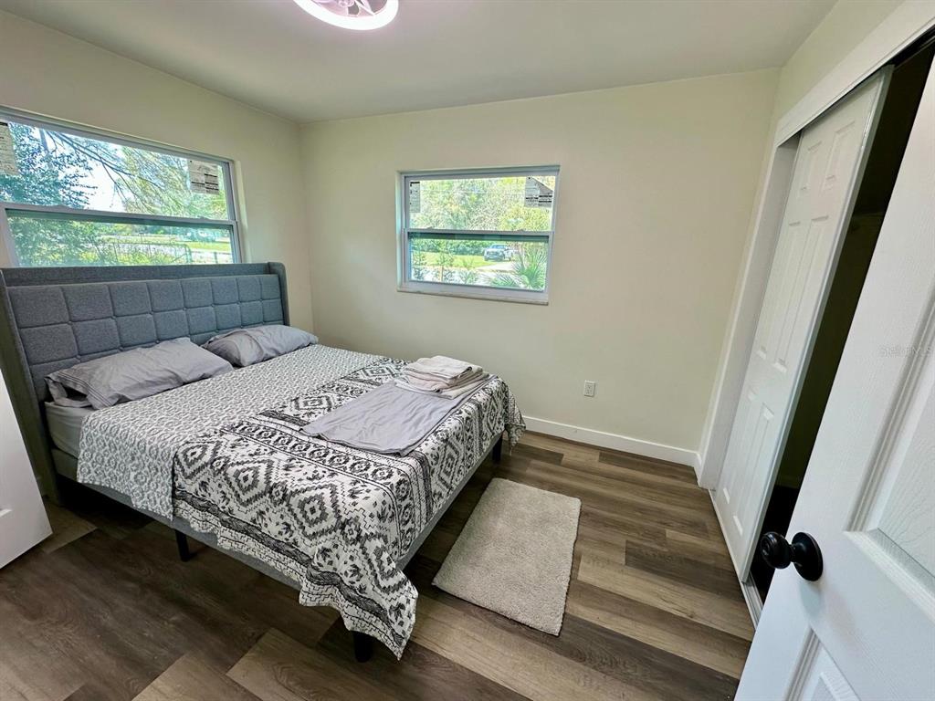 1812 Northeast 50th Street Ocala, FL 34479 - Photo 10 of 15 a bedroom with a bed and window