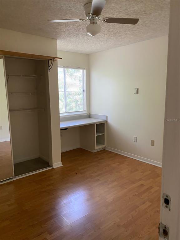 2601 Southwest Archer Road, Unit 321 Gainesville, FL 32608 - Photo 6 of 10 an empty room with windows