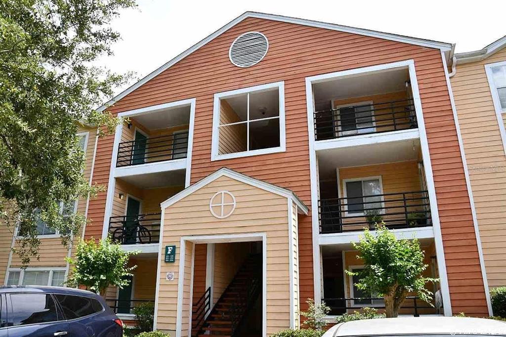 2601 Southwest Archer Road, Unit 321 Gainesville, FL 32608 - Photo 10 of 10 a front view of a house with plants