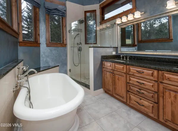 a bathroom with a sink and bathtub
