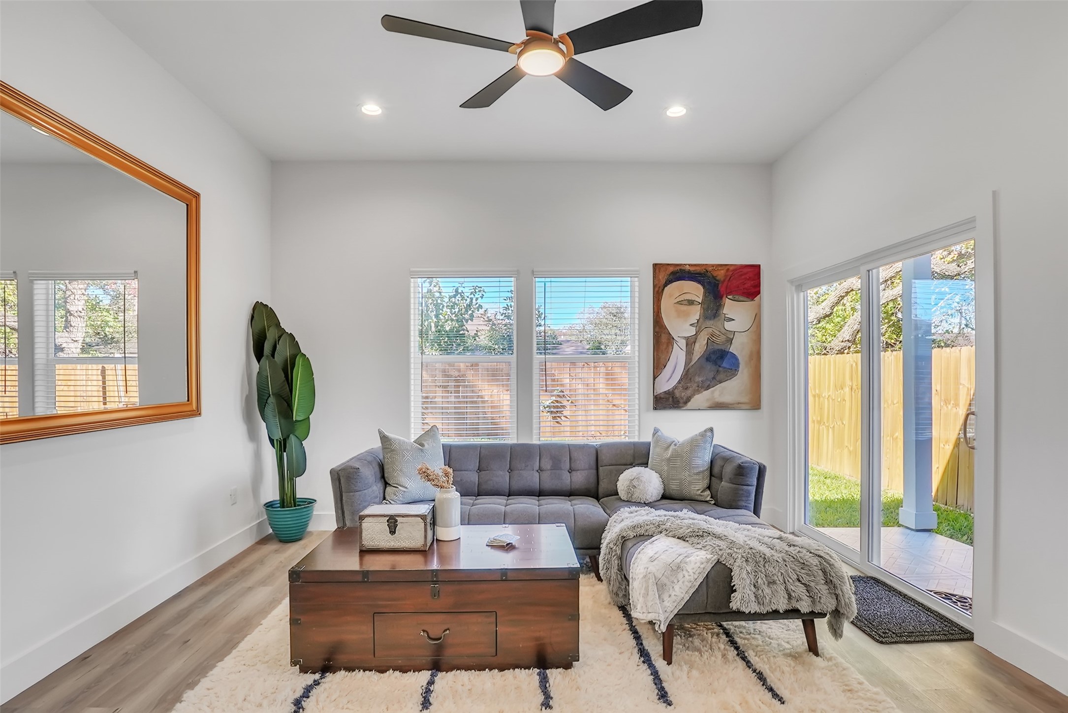 8012 Brandon Street Houston, TX 77051 - Photo 6 of 29 a living room with furniture and a large window