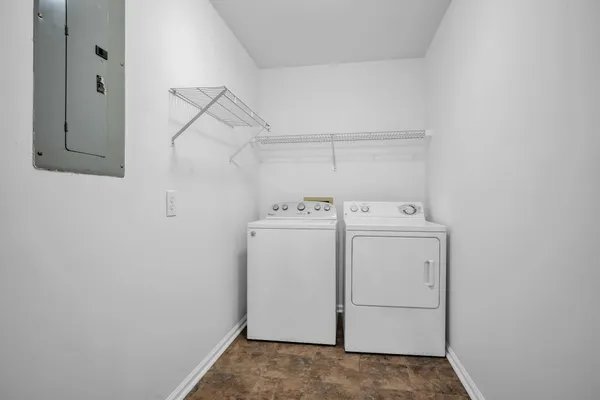 a utility room with dryer and washer