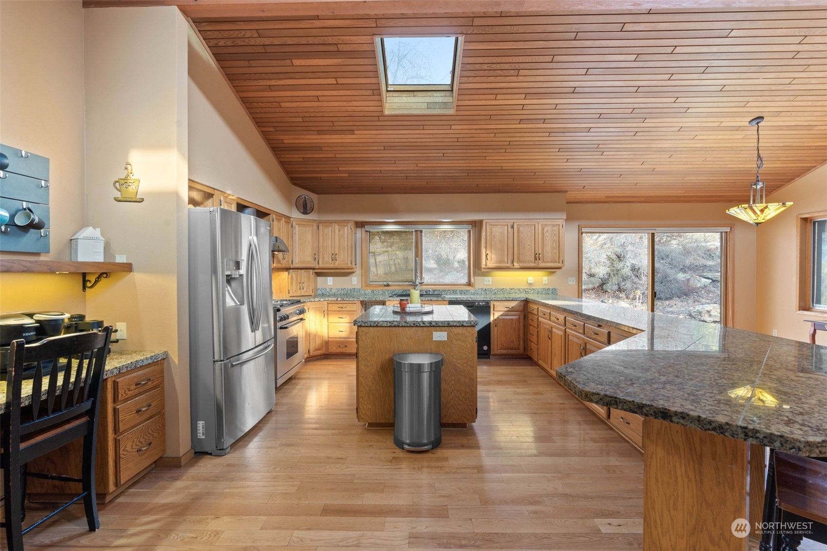 4209 South Eastern Road Spokane, WA 99223 - Photo 15 of 40 a kitchen with lots of counter top space and stainless steel appliances
