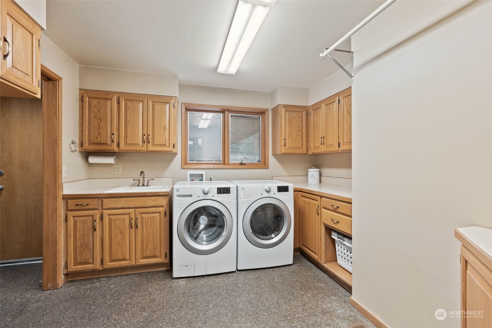 4209 South Eastern Road Spokane, WA 99223 - Photo 20 of 40 a utility room with sink dryer and washer