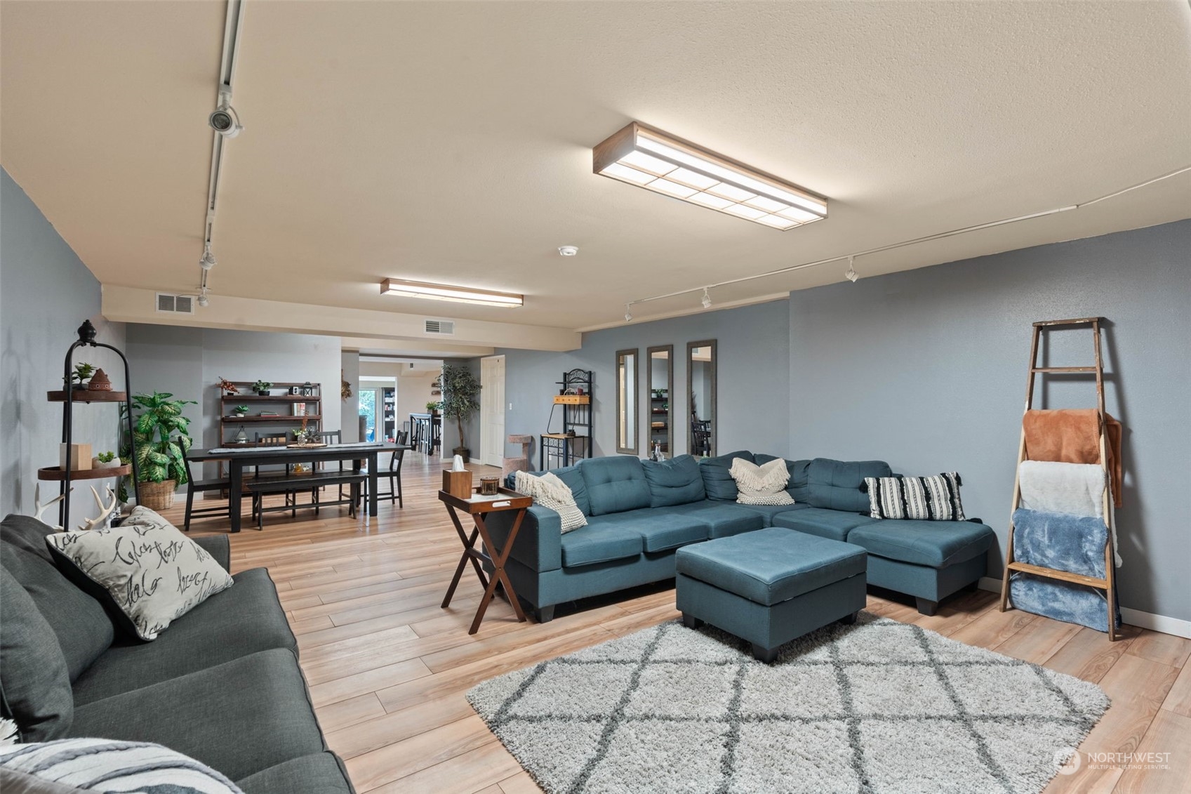 4209 South Eastern Road Spokane, WA 99223 - Photo 31 of 40 a living room with furniture and wooden floor