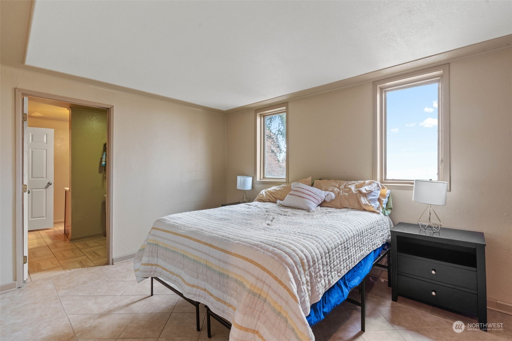 4209 South Eastern Road Spokane, WA 99223 - Photo 33 of 40 a bedroom with a bed and a window
