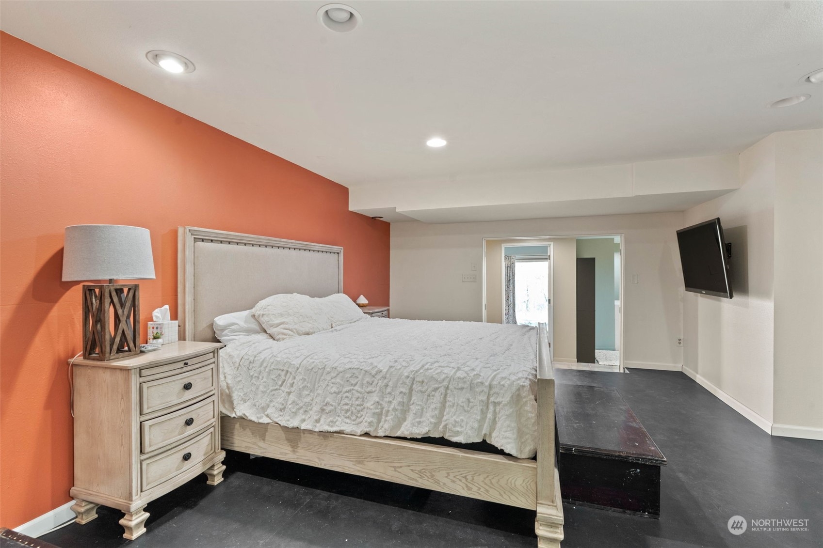 4209 South Eastern Road Spokane, WA 99223 - Photo 35 of 40 a bedroom with a bed and flat screen tv